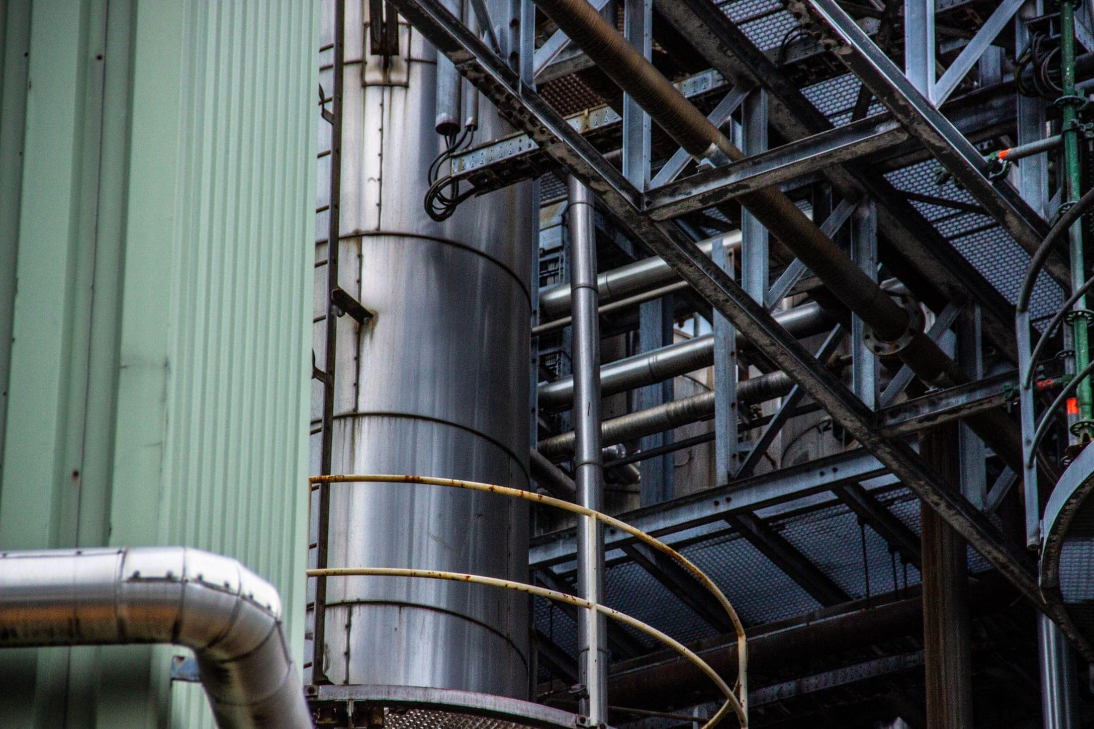Process column and pipework inside an industrial building