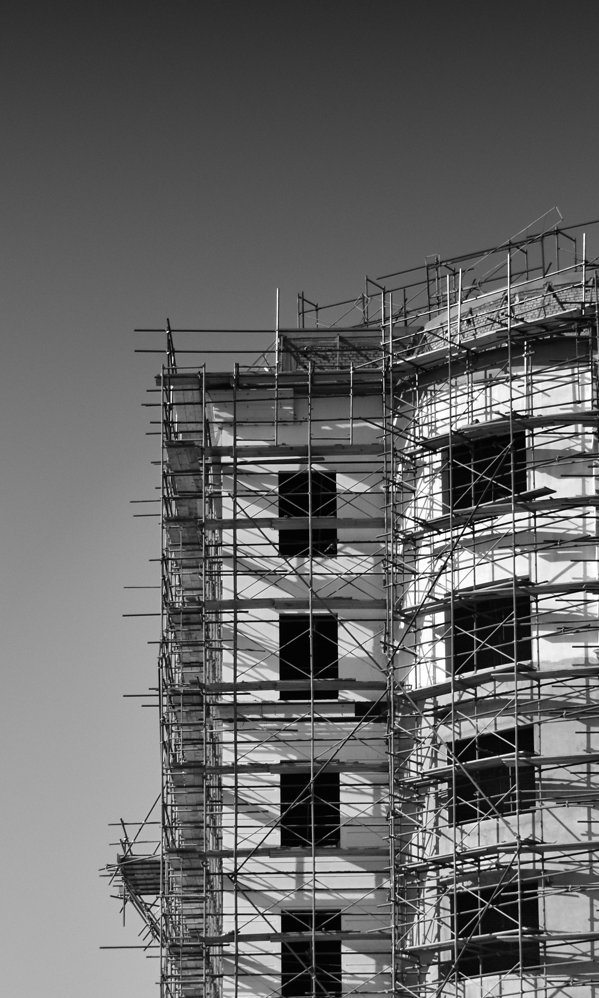 Scaffolding erected across the façade of a structure under works